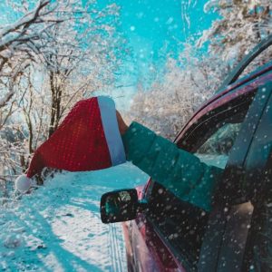 santa hat hanging out car window